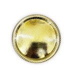 Hand hammered circle tray with ball feet showing textured surface and ornate perforated side detail