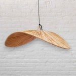 Natural handwoven wood pendant light showing detailed butterfly wing construction and radial veneer pattern