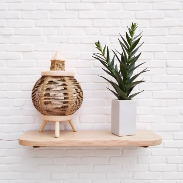 Minimalist white backdrop showcasing handmade straw table lamp