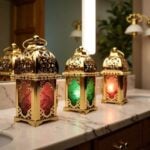 Engraved brass candle holders set displayed on marble counter with intricate filigree dome and colored glass