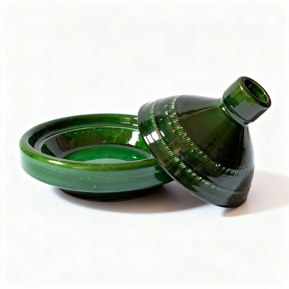 Green ceramic tagine pot separated showing base and conical lid design
