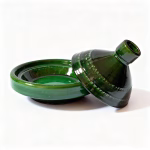 Green ceramic tagine pot separated showing base and conical lid design