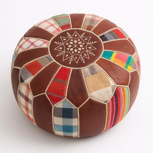Top view of round leather pouf ottoman with snowflake pattern