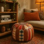 Handstitched leather round ottoman 21" with vibrant textile patchwork in cozy reading nook with plants