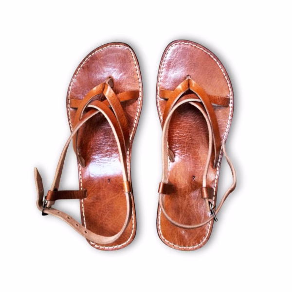 Traditional brown leather sandals flat lay