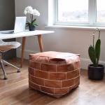 Handcrafted Moroccan square leather pouf ottoman in home office setting