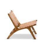 Side profile of mid-century leather lounge chair showing curved teak frame and woven seat