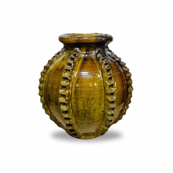 Artisanal Moroccan ceramic vase featuring raised pattern detailing in warm brown glaze