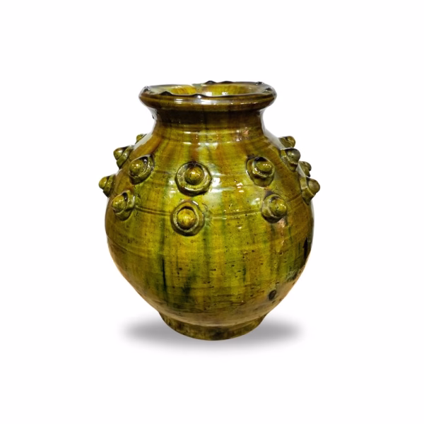 Artisanal Tamegroute pottery vase displaying unique glazing variations and handcrafted details