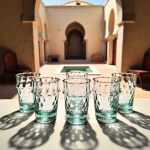 Authentic glasses of tea creating artistic shadows in natural light