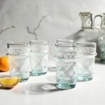 Hand-painted recycled aqua glass white geometric tea glasses with Moroccan lattice patterns in a set of six