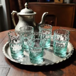 Complete Moroccan tea service with teapot and traditional glasses