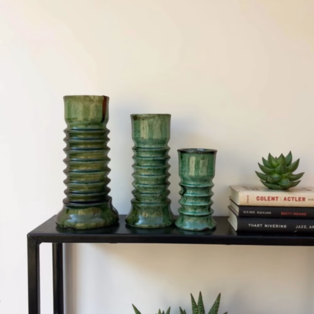 Green ceramic candleholder set with modern styling