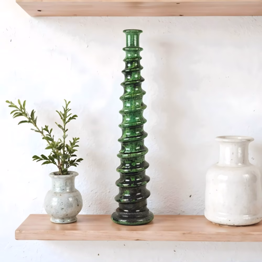 Green ceramic tall candle holder with minimalist decor