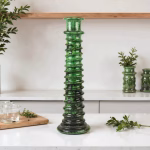 Green ceramic tall candle holder with botanical decor