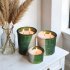Handmade ceramic candle trio with green Tamegroute glaze displayed with dried pampas grass on white nightstand