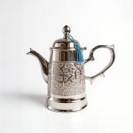 Hand-engraved luxury silver coffee server pot with intricate geometric patterns and traditional Moroccan design