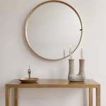 Handmade U-shaped candleholder styled with round mirror