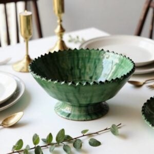 Handpainted ceramic dinnerware featuring artisanal craftsmanship and sustainable materials