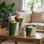 Green glazed ceramic candle trio burning on wooden coffee table creating ambient glow in cozy living space