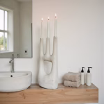 Modern triple candle holder in minimalist bathroom