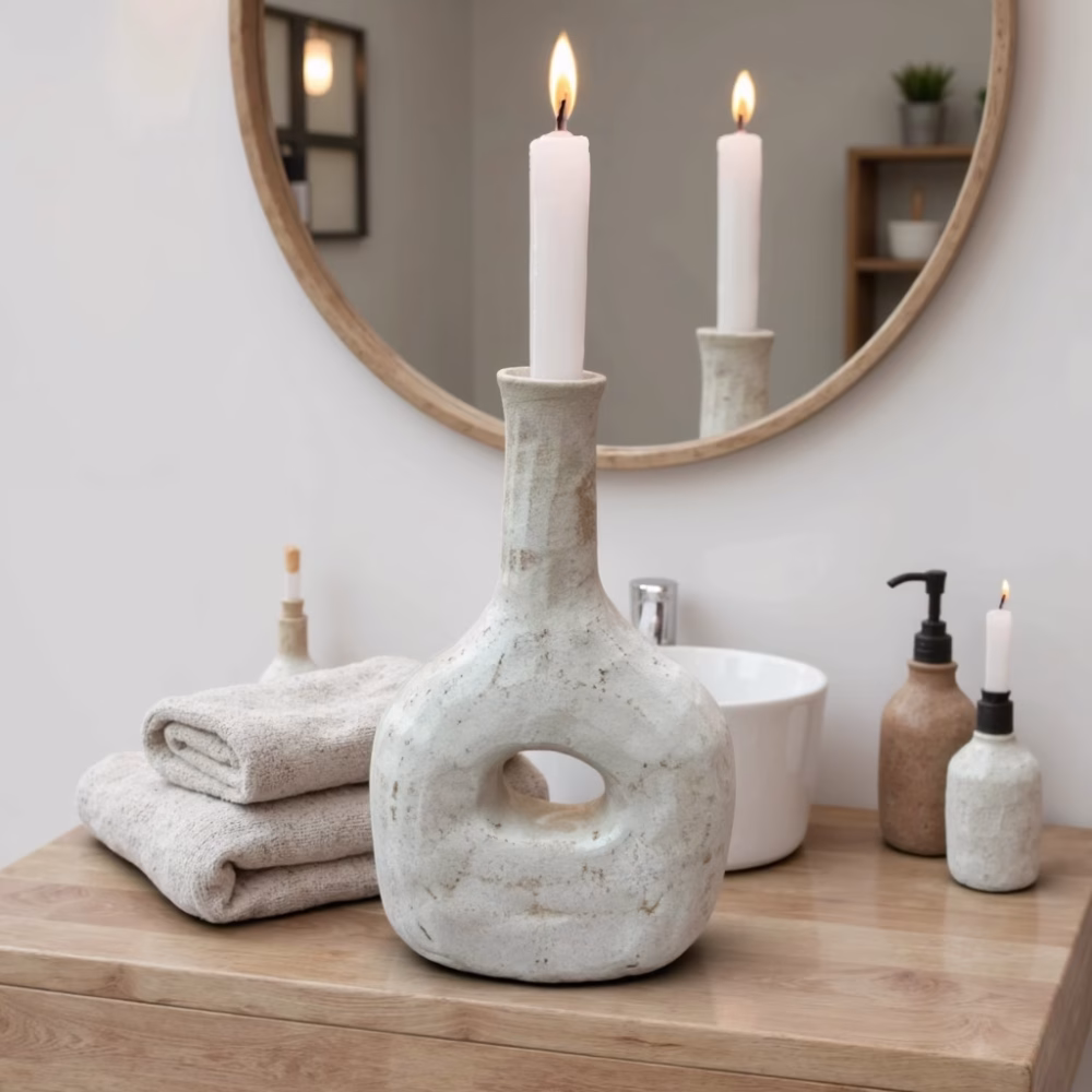 Moroccan ceramic candleholder styled in bathroom with mirror