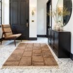 Soft pink Moroccan wool rug under office chair showing plush pile and contemporary grid design