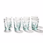 Set of six traditional Moroccan glasses of tea with intricate diamond pattern