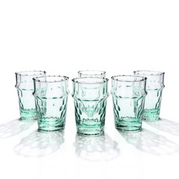 Set of six traditional Moroccan glasses of tea with intricate diamond pattern