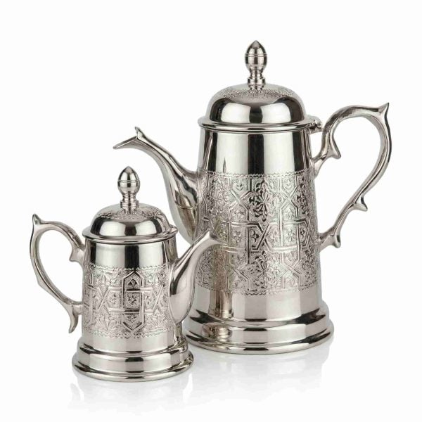 Moroccan silver coffee server set of two sizes with hand-engraved Islamic geometric patterns on white background