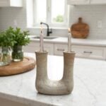 Tamegroute ceramic double candleholder with warm patina on marble kitchen counter, modern farmhouse decor