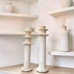 White Tamegroute candleholder pair styled with floating shelves