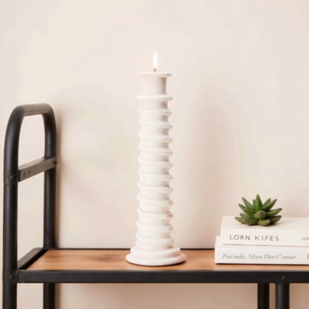 White ceramic tall candle holder on metal stand