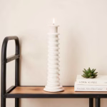 White ceramic tall candle holder on metal stand