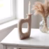 White square candle holder with pampas grass decor
