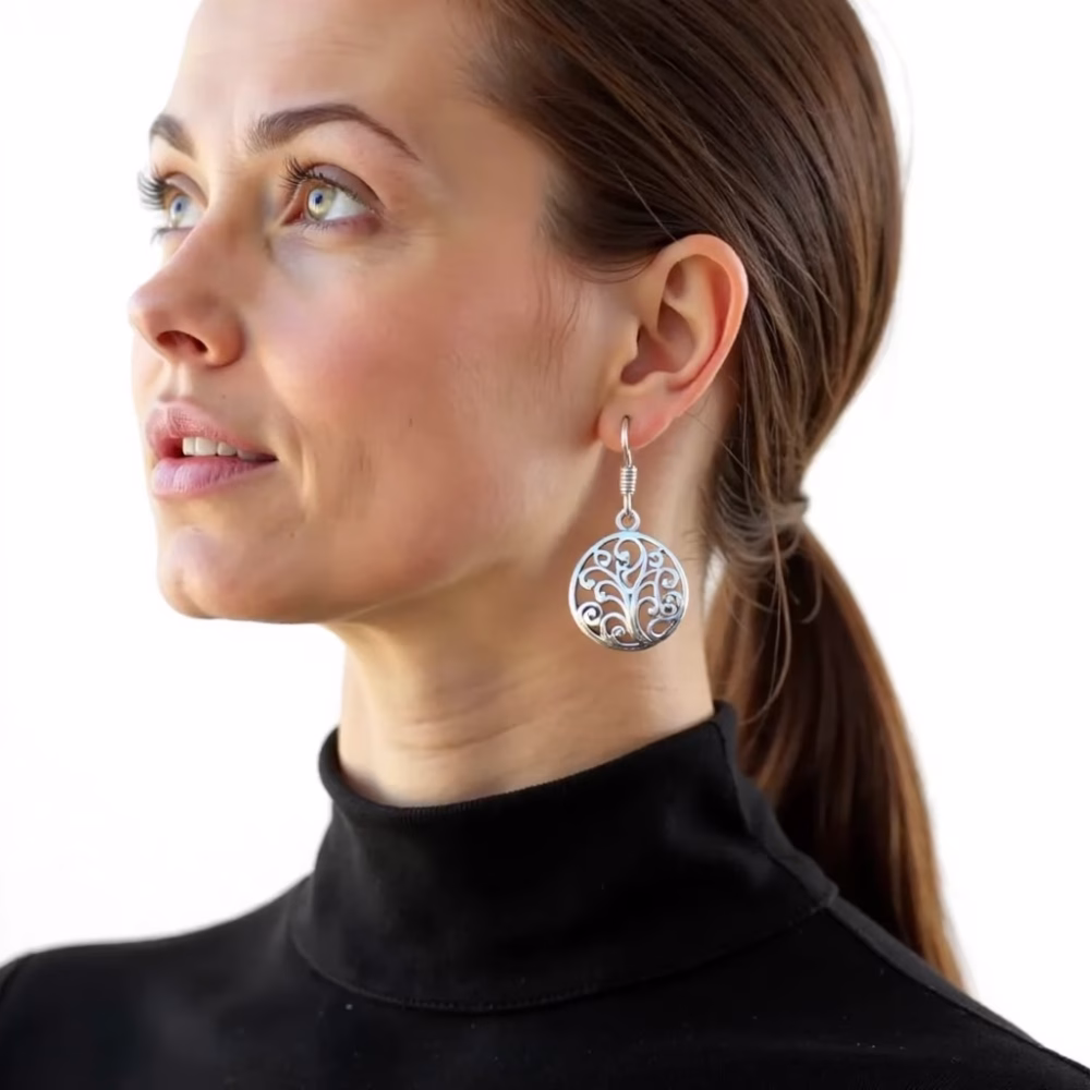Close-up of silver filigree drop earrings