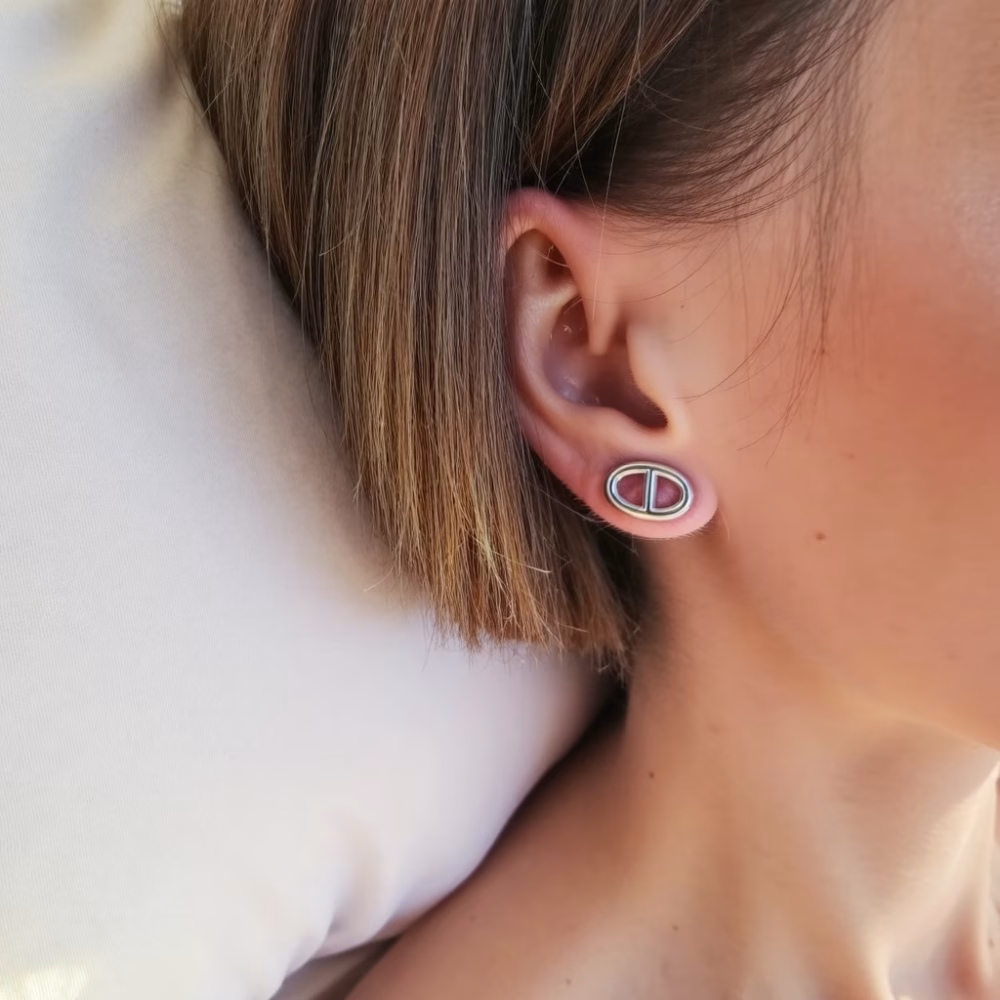 Close-up of silver stud earrings