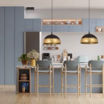 Duo brass dome pendants illuminating modern kitchen island