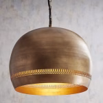 Illuminated brass dome pendant light showcasing intricate engravings