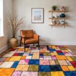 Patchwork color block rug in modern dining room with rainbow squares complementing colorful upholstered chairs