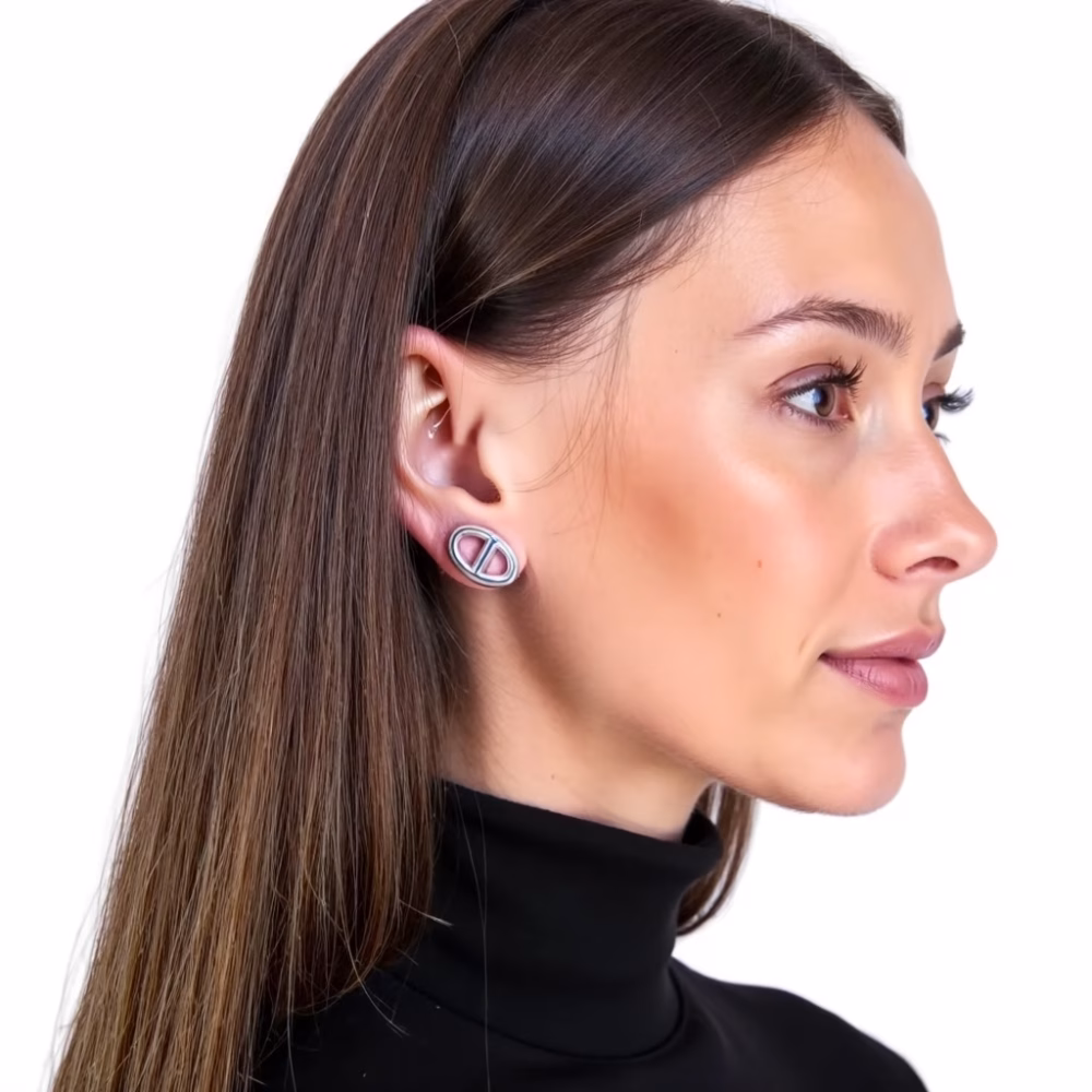 Profile view of silver circle earrings