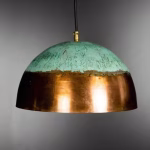Side profile of handcrafted dome lamp with patinated green top