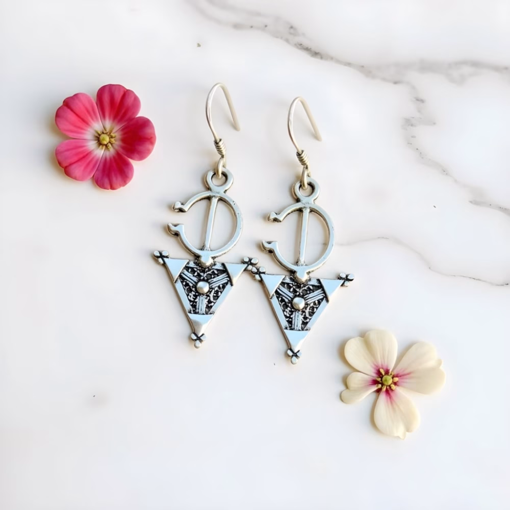 Silver Berber fibula earrings with floral accents