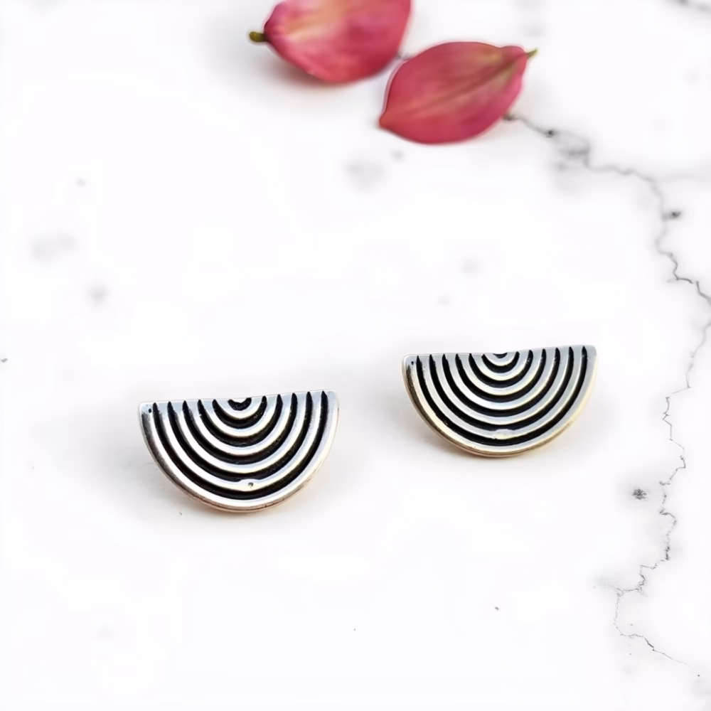 Silver half circle earrings with striped pattern