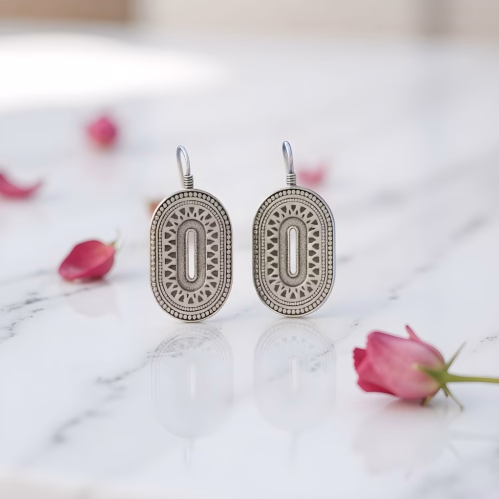Silver oval earrings with Berber patterns