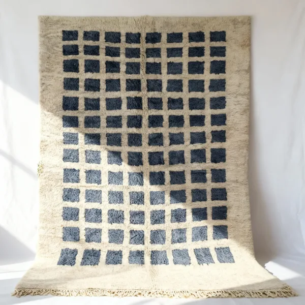 gray grid pattern Moroccan rug with traditional fringe detail