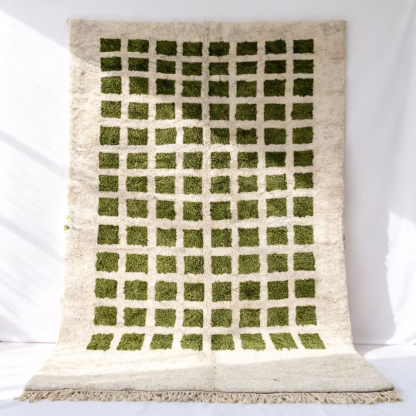 green grid pattern Moroccan rug with traditional fringe detail