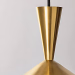 Close-up detail of brass cone pendant light finial