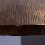 Close-up of hammered copper texture detail