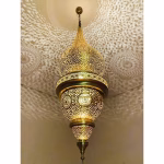 Detailed view of handcrafted brass pendant lamp shade